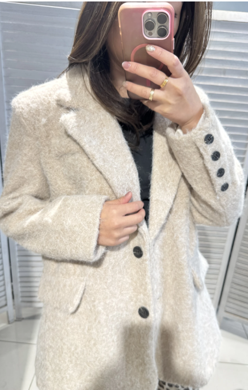 Veste chic en laine bouclée